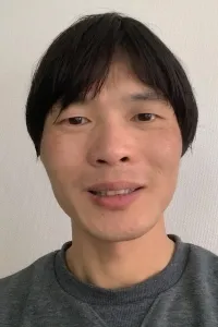 甘 毅 先生